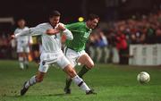 13 February 2002; Robbie Keane of Republic of Ireland in action against Yuri Nikiforov of Russia during the International Friendly match between Republic of Ireland and Russia at Lansdowne Road in Dublin. Photo by Pat Murphy/Sportsfile