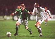 13 February 2002; Damien Duff of Republic of Ireland in action against Viktor Onopko of Russia during the International Friendly match between Republic of Ireland and Russia at Lansdowne Road in Dublin. Photo by Matt Browne/Sportsfile