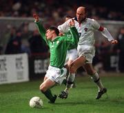 13 February 2002; Steve Finnan of Republic of Ireland in action against Viktor Onopko of Russia during the International Friendly match between Republic of Ireland and Russia at Lansdowne Road in Dublin. Photo by Pat Murphy/Sportsfile