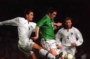 13 February 2002; Robbie Keane of Republic of Ireland Yuri Nikiforov of Russia during the International Friendly match between Republic of Ireland and Russia at Lansdowne Road in Dublin. Photo by David Maher/Sportsfile