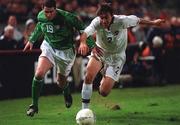 13 February 2002; Mark Kennedy of Republic of Ireland in action against Yuri Kovrun of Russia during the International Friendly match between Republic of Ireland and Russia at Lansdowne Road in Dublin. Photo by Pat Murphy/Sportsfile