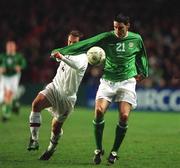 14 February 2002; Richar Sadlier of Republic of Ireland  in action against Dimitri Khlestov of Russia during the International Friendly match between Republic of Ireland and Russia at Lansdowne Road in Dublin. Photo by Matt Browne/Sportsfile