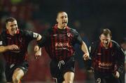 15 February 2002; Dave Morrison of Bohemians, celebrates after scoring his side's first goal with team-mates Stephen Caffrey and Trevor Molloy during the eircom League Premier Division match between Bohemians and Shamrock Rovers at Dalymount Park in Dublin. Photo by David Maher/Sportsfile