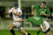 15 February 2002; Declan Danaher of England A, breaks past Tyrone Howe of Ireland A during the &quot;A&quot;  Rugby International match between England and Ireland at Franklin Gardens in Northampton, England. Photo by Sportsfile