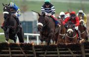 16 February 2002; Fadoudal Du Cochet, with Conor O'Dwyer up, right, clears the last ahead of Bob Justice, with Ruby Walsh up, to go on and win The Red Mills Trial Hurdle at Gowran Park Racecourse in Gowran, Kilkenny. Photo by Damien Eagers/Sportsfile
