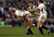 16 February 2002; Mike Tindall of England, is tackled by David Wallace of Ireland during the Lloyds TSB Six Nations Championship match between England and Ireland at Twickenham Stadium in London, England. Photo by Brendan Moran/Sportsfile