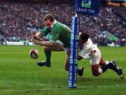 16 February 2002; Denis Hickie of Ireland drops the ball just short of the try line while being tackled by Jason Robinson of England during the Lloyds TSB Six Nations Championship match between England and Ireland at Twickenham Stadium in London, England. Photo by Brendan Moran/Sportsfile