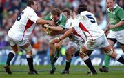 16 February 2002; Denis Hickie of Ireland is tackled by England players Richard Hill, left, Ben Kay, right, and Steve Thompson, centre, during the Lloyds TSB Six Nations Championship match between England and Ireland at Twickenham Stadium in London, England. Photo by Matt Browne/Sportsfile