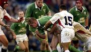 16 February 2002; Gary Longwell of Ireland, is tackled by Jason Robinson of England during the Lloyds TSB Six Nations Championship match between England and Ireland at Twickenham Stadium in London, England. Photo by Brendan Moran/Sportsfile