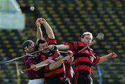 17 February 2002; Paul Foley, left and Mick Mahony of Ballygunner in action against Aidan Quinn of Clarinbridge during the AIB All Ireland Club Hurling Championship Semi-Final match between Clarinbridge and Ballygunner at Semple Stadium in Thurles, Tipperary. Photo by Pat Murphy/Sportsfile