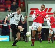 17 February 2002; Conor O'Grady of Cork City in action against Paul Osam of St Patrick's Athletic during the eircom League Premier Division match between St Patrick's Athletic and Cork City at Richmond Park in Dublin. Photo by Brian Lawless/Sportsfile