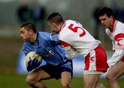17 February 2002; Alan Brogan of Dublin in action against Ryan McMenamin of Tyrone during the Allianz National Football League Division 1A Round 2 match between Tyrone and Dublin at O'Neill Park in Dungannon, Tyrone. Photo by Brendan Moran/Sportsfile