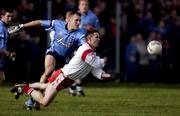 17 February 2002; Ciaran Gourley of Tyrone in action against Ciaran Whelan of Dublin during the Allianz National Football League Division 1A Round 2 match between Tyrone and Dublin at O'Neill Park in Dungannon, Tyrone. Photo by Brendan Moran/Sportsfile