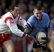 17 February 2002; Ciaran Whelan of Dublin in action against Brian Dooher of Tyrone during the Allianz National Football League Division 1A Round 2 match between Tyrone and Dublin at O'Neill Park in Dungannon, Tyrone. Photo by Brendan Moran/Sportsfile
