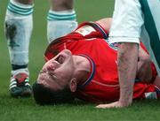 17 February 2002; Kevin Doherty of Shelbourne lies injured after a heavy challenge during the eircom League Premier Division match between Bray Wanderers and Shelbourne at the Carlisle Grounds in Bray, Wicklow. Photo by David Maher/Sportsfile
