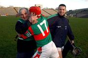 17 February 2002; Birr manager Pa Joe Whelahan celebrates with Paul Molloy of Birr following their side's victory over Dunloy in the AIB All Ireland Club Hurling Championship Semi-Final match between Birr and Dunloy at St Tiernach's Park in Clones, Monaghan. Photo by Damien Eagers/Sportsfile