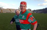 17 February 2002; Paul Molloy of Birr celebrates with Birr manager Pa Joe Whelahan following the AIB All Ireland Club Hurling Championship Semi-Final match between Birr and Dunloy at St Tiernach's Park in Clones, Monaghan. Photo by Damien Eagers/Sportsfile