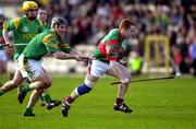 17 February 2002; Simon Whelahan of Birr in action against Sean Mullan of Dunloy during the AIB All Ireland Club Hurling Championship Semi-Final match between Birr and Dunloy at St Tiernach's Park in Clones, Monaghan. Photo by Damien Eagers/Sportsfile
