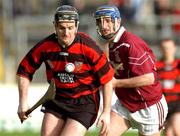 17 February 2002; Paul Flynn of Ballygunner in action against Mark Kerins of Clarinbridge during the AIB All Ireland Club Hurling Championship Semi-Final match between Clarinbridge and Ballygunner at Semple Stadium in Thurles, Tipperary. Photo by Ray McManus/Sportsfile