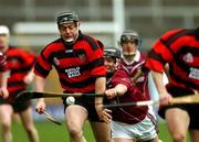 17 February 2002; Paul Flynn of Ballygunner is tackled by Liam Madden of Clarinbridge during the AIB All Ireland Club Hurling Championship Semi-Final match between Clarinbridge and Ballygunner at Semple Stadium in Thurles, Tipperary. Photo by Ray McManus/Sportsfile