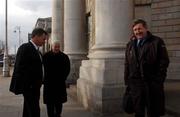 18 February 2002; Ollie Byrne of Shelbourne, right, with Roy Dooney, eircom Commisioner, left, and Brendan Menton, Chief Executive FAI,  outside the High Court in Dublin as Shelbourne Take Legal Action Against FAI Over Paul Marney Affair. Photo by David Maher/Sportsfile