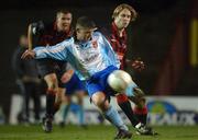 18 February 2002; Darren McCready of Derry City in action against Kevin Hunt of Bohemians during the eircom League Cup Semi-Final match between Bohemians and Derry City at Dalymount Park in Dublin. Photo by David Maher/Sportsfile
