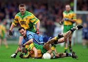 10 February 2002; John McNally of Dublin, in action against Eamon Doherty of Donegal during the Allianz National Football League Division 1A Round 1 match between Dublin and Donegal at Parnell Park in Dublin. Photo by Ray McManus/Sportsfile