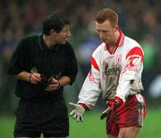 10 February 2002; Referee Brian White books Brian McGuckin of Tyrone during the Allianz National Football League Division 1A Round 1 match between Galway and Tyrone at Duggan Park in Ballinasloe, Galway. Photo by Damien Eagers/Sportsfile