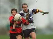 19 February 2002; Orla Colreavy of UCD in action against Jean Lucey of UCC during the Higher Education League Ladies Football Final between UCD and UCC at  Donnybrook in Dublin. Photo by Aofie Rice/Sportsfile
