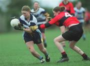 19 February 2002; Elaine Duffy of UCD in action against Kate Gleeson of UCC during the Higher Education League Ladies Football Final between UCD and UCC at  Donnybrook in Dublin. Photo by Aofie Rice/Sportsfile