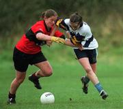 19 February 2002; Tracey Lawlor of UCD in action against Meadbh De Nais of UCC during the Higher Education League Ladies Football Final between UCD and UCC at  Donnybrook in Dublin. Photo by Aofie Rice/Sportsfile