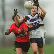 19 February 2002; Orla Colreavy of UCD in action against Jean Lucey of UCC during the Higher Education League Ladies Football Final between UCD and UCC at  Donnybrook in Dublin. Photo by Aofie Rice/Sportsfile