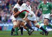 16 February 2002; Denis Hickie of Ireland, is tackled by Ben Kay and Steve Thompson of England during the Lloyds TSB Six Nations Championship match between England and Ireland at Twickenham Stadium in London, England. Photo by Matt Browne/Sportsfile