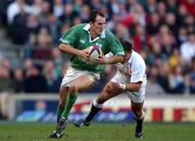 16 February 2002; Girvan Dempsey of Ireland, races clear of Jason Robinson of England during the Lloyds TSB Six Nations Championship match between England and Ireland at Twickenham Stadium in London, England. Photo by Matt Browne/Sportsfile