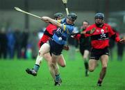 19 February 2002; Alan Barry of UCD in action against John Browne of  UCC during the Fitzgibbon Cup Final Replay match between UCD and UCC at McDonagh Park in Nenagh, Tipperary. Photo by Photo by Matt Browne/Sportsfile
