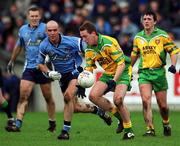 10 February 2002; Raymond Sweeney of Donegal in action against  James O'Connor of Dublin during the Allianz National Football League Division 1A Round 1 match between Dublin and Donegal at Parnell Park in Dublin. Photo by Ray McManus/Sportsfile