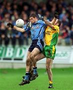 10 February 2002; Darren Magee of Dublin in action against Paul McGonigle of Donegal during the Allianz National Football League Division 1A Round 1 match between Dublin and Donegal at Parnell Park in Dublin. Photo by Ray McManus/Sportsfile