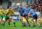 10 February 2002; Michael Hegarty of Donegal, in action against Darren Homan of Dublin, centre, during the Allianz National Football League Division 1A Round 1 match between Dublin and Donegal at Parnell Park in Dublin. Photo by Ray McManus/Sportsfile