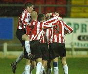 22 February 2002; Derry City players celebrate after Liam Coyle scored his side's first goal from the penalty spot during the eircom League Premier Division match between Derry City and Shamrock Rovers at the Brandywell Stadium in Derry. Photo by Matt Browne/Sportsfile