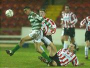 22 February 2002; Richie Byrne of Shamrock Rovers is tackled by Liam Coyle of Derry City during the eircom League Premier Division match between Derry City and Shamrock Rovers at the Brandywell Stadium in Derry. Photo by Matt Browne/Sportsfile