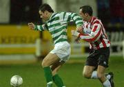 22 February 2002; Stephen Grant of Shamrock Rovers in action against Paddy Mclaughlin of Derry City during the eircom League Premier Division match between Derry City and Shamrock Rovers at the Brandywell Stadium in Derry. Photo by Matt Browne/Sportsfile