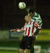 22 February 2002; Jamie Hughes of Derry City in action against Terry Palmer of Shamrock Rovers during the eircom League Premier Division match between Derry City and Shamrock Rovers at the Brandywell Stadium in Derry. Photo by Matt Browne/Sportsfile