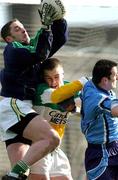 23 February 2002; Padraig Kelly of Offaly claims the ball ahead of team-mate Ger Rafferty and John McNally of Dublin during the Allianz National Football League Division 1A match between Offaly and Dublin at O'Connor Park in Tullamore, Offaly. Photo by Damien Eagers/Sportsfile
