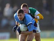 23 February 2002; Darren Magee of Dublin in action against Basil Malone of Offaly during the Allianz National Football League Division 1A match between Offaly and Dublin at O'Connor Park in Tullamore, Offaly. Photo by Damien Eagers/Sportsfile