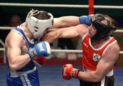 22 February 2002; Cathal McMonagle, left, in action against Eanna Falvey during the Super Heavyweight Final between Eanna Falvey and Cathal McMonagle during the National Senior Boxing Championships at the The National Stadium in Dublin. Photo by Damien Eagers/Sportsfile