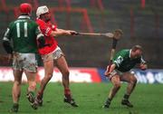 25 February 2002; Timmy McCarthy of Cork has his shot blocked by Stephen McDonagh of Limerick during the Allianz National Hurling League Division 1B Round 1 match between Limerick and Cork at the Gaelic Grounds in Limerick. Photo by Brendan Moran/Sportsfile