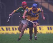 24 February 2002; Tony Carmody of Clare is tackled by Brian Perry of Meath during the Allianz National Hurling League Division 1 Round1 match between Clare and Meath at Pairc Tailteann in Navan, Meath. Photo by Aofie Rice/Sportsfile