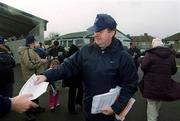 10 February 2002; Jim Nugent, Secretary of The Dublin Supporters Club, hands out leaflets containing information about their petition, which states their opposition to The GAA Srategic Review Commitee's proposal to establish 2 Senior Football Teams and 2 County Boards within Dublin and calls for the proposal to be withdrawn immediately, ahead of the during the Allianz National Football League Division 1A Round 1 match between Dublin and Donegal at Parnell Park in Dublin. Photo by Ray McManus/Sportsfile