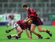 17 February 2002; David Donoghue of Clarinbridge in action against Niall O'Donnell of Ballygunner during the AIB All Ireland Club Hurling Championship Semi-Final match between Clarinbridge and Ballygunner at Semple Stadium in Thurles, Tipperary. Photo by Pat Murphy/Sportsfile