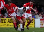 24 February 2002; Stephen Geoghegan of Shelbourne in action against Declan Daly, left, and Alan Bennett of Cork City during the eircom League Premier Division match between Cork City and Shelbourne at Turners Cross in Cork. Photo by Matt Browne/Sportsfile